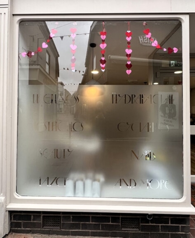 Lumi SKN Clinics window graphics Photo